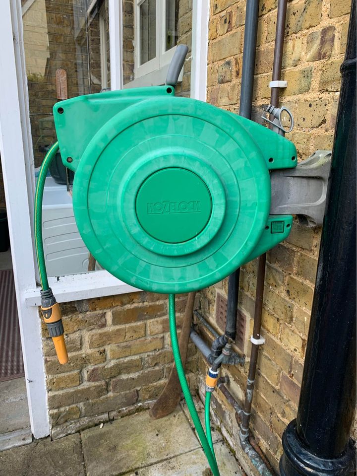Comparing an automatic garden hose reel with a standard hose reel for ease  of use » Shetland's Garden Tool Box